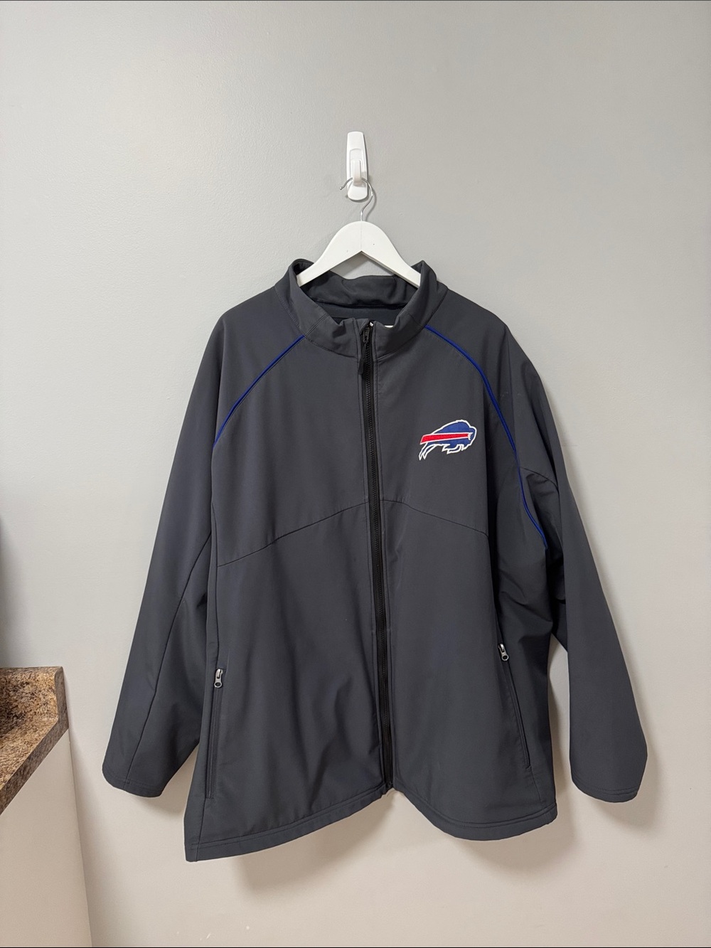 NFL Black Lightweight Jacket with Blue Piping and Team Logo
